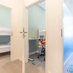 Large Group With 2 Bathrooms & Single Beds